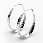 Oval hoop sterling silver concaved earrings