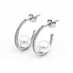 
            
                Load image into Gallery viewer, Oval white fresh water pearl cubic zirconia sterling silver rhodium plated earrings
            
        